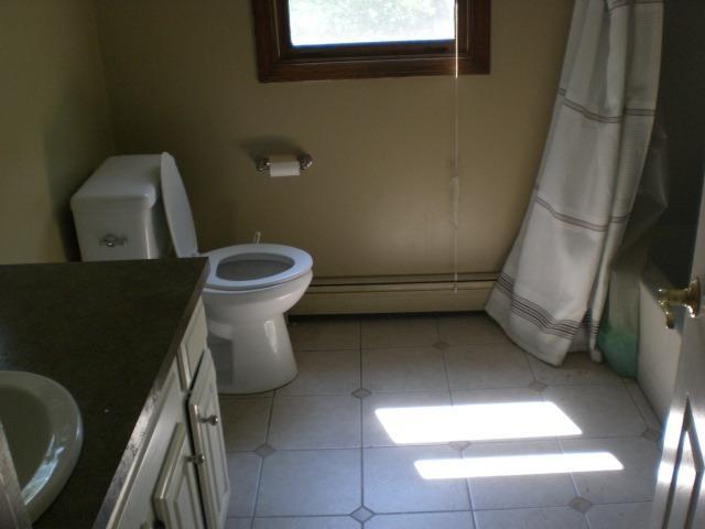 12 Radcliffe Road Mashpee, MA 02649 - Photo 8 of 9 a bathroom with a toilet