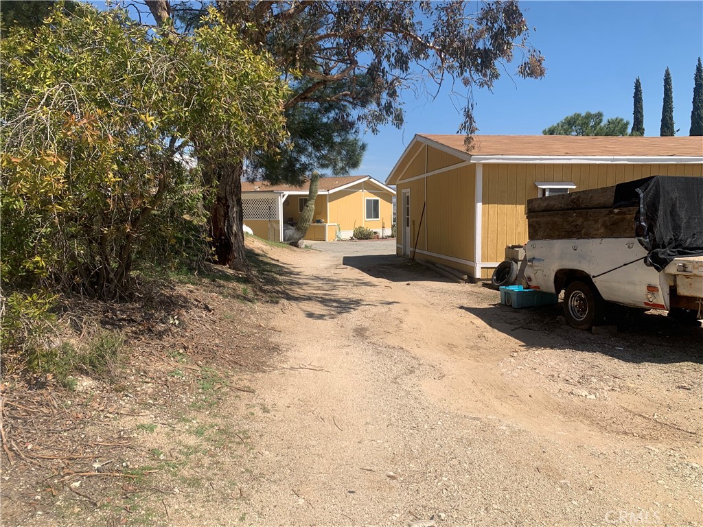 14250 Howe Place Beaumont, CA 92223 - Photo 14 of 31 a view of a car park in front of house