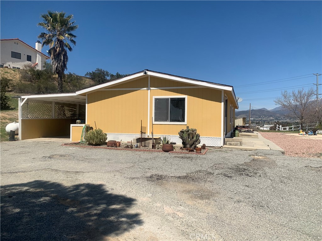 14250 Howe Place Beaumont, CA 92223 - Photo 10 of 31 a view of a house with a snow in the background