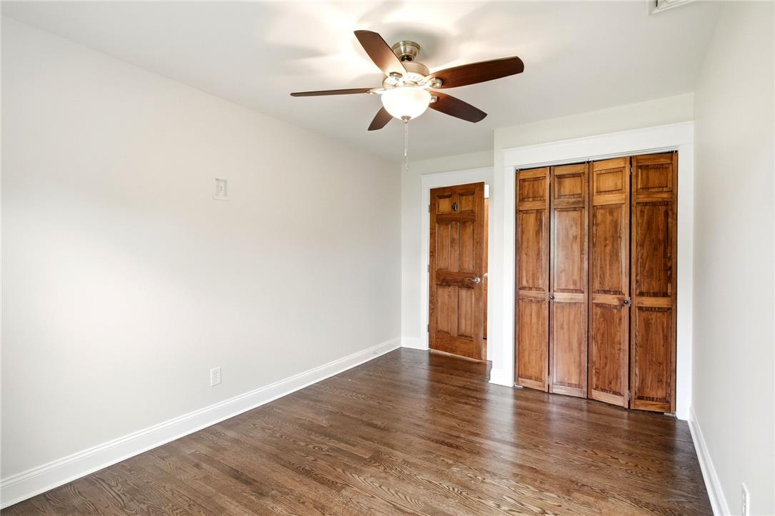 463 North Penn Dixie Road Bath, PA 18014 - Photo 21 of 86 Rich hardwood flooring and a ceiling fan appoint this versatile bedroom.