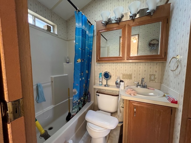 2795 East 28th Road Marseilles, IL 61341 - Photo 20 of 59 a bathroom with a sink a toilet and shower