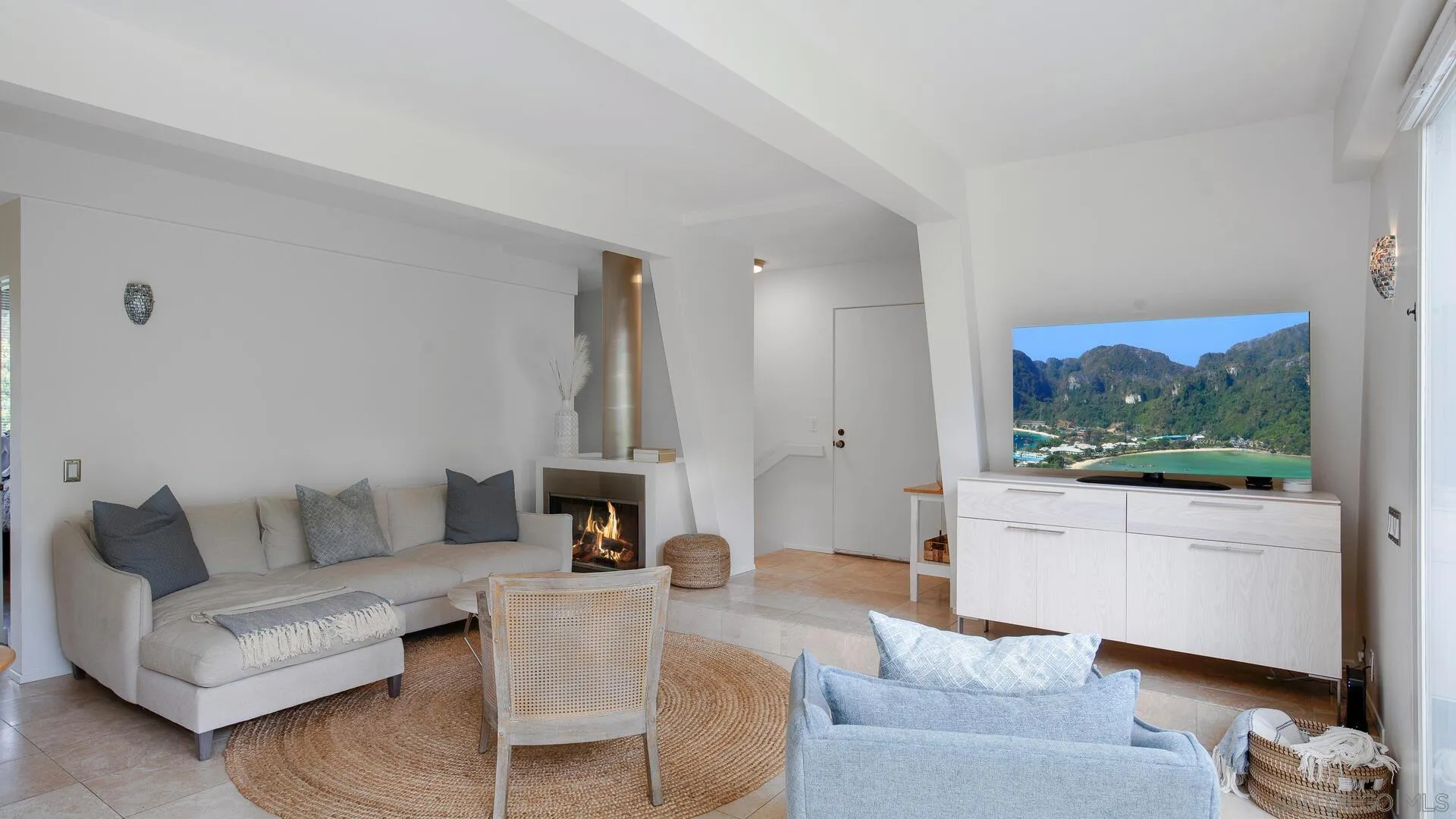 549 Rimini Road Del Mar, CA 92014 - Photo 5 of 32 a living room with furniture and a large window