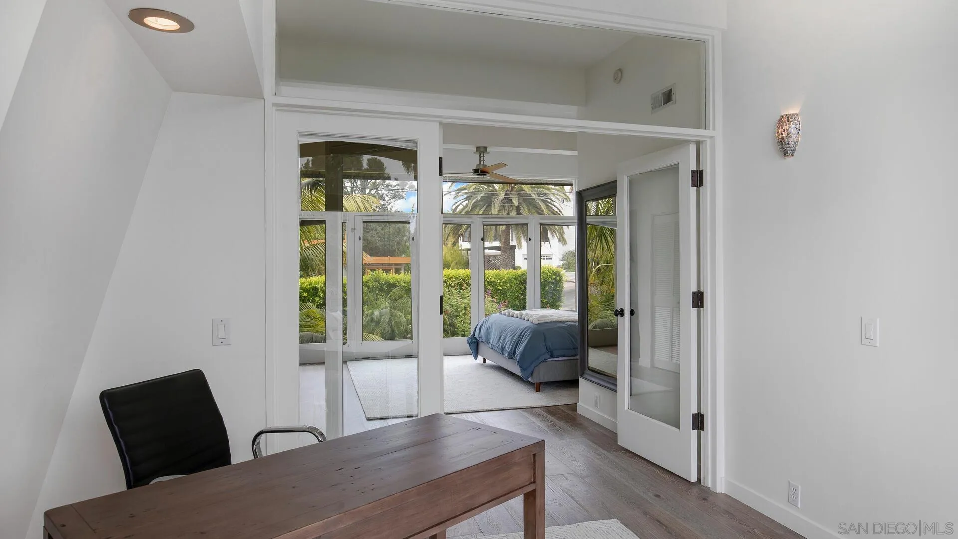 549 Rimini Road Del Mar, CA 92014 - Photo 7 of 32 a living room with furniture and a large window