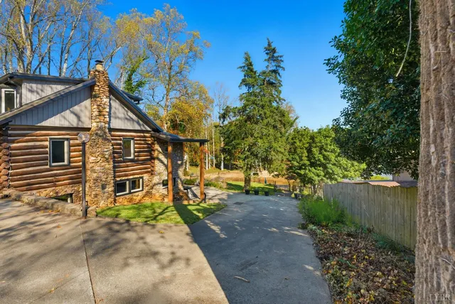 a view of yard with patio