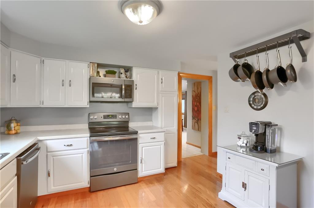 220 Kilgallen Road Butler, PA 16002 - Photo 14 of 50 a kitchen with a stove and a refrigerator
