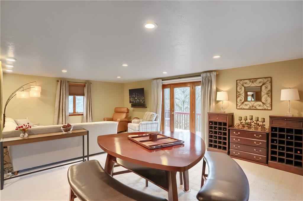 220 Kilgallen Road Butler, PA 16002 - Photo 15 of 50 a living room with fireplace furniture and a large window
