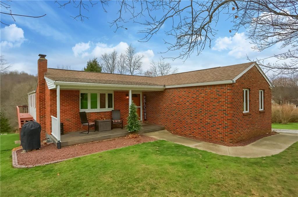 220 Kilgallen Road Butler, PA 16002 - Photo 2 of 50 a view of a house with a yard and sitting area