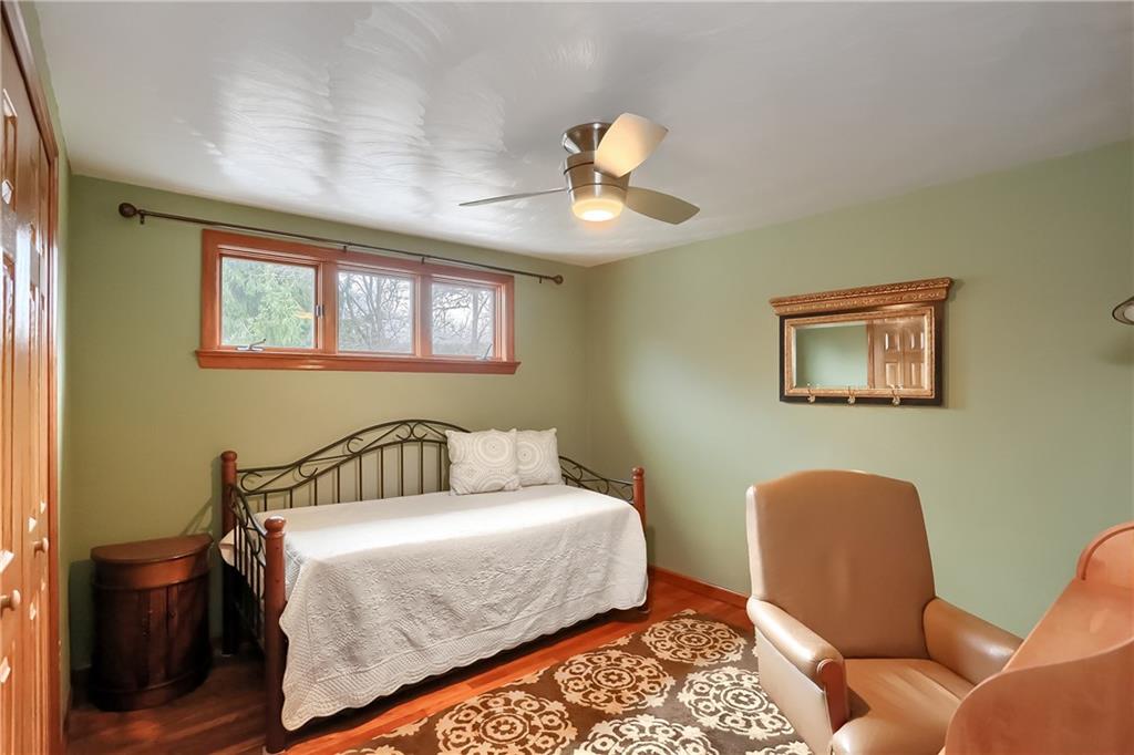 220 Kilgallen Road Butler, PA 16002 - Photo 31 of 50 a bedroom with a bed and chair