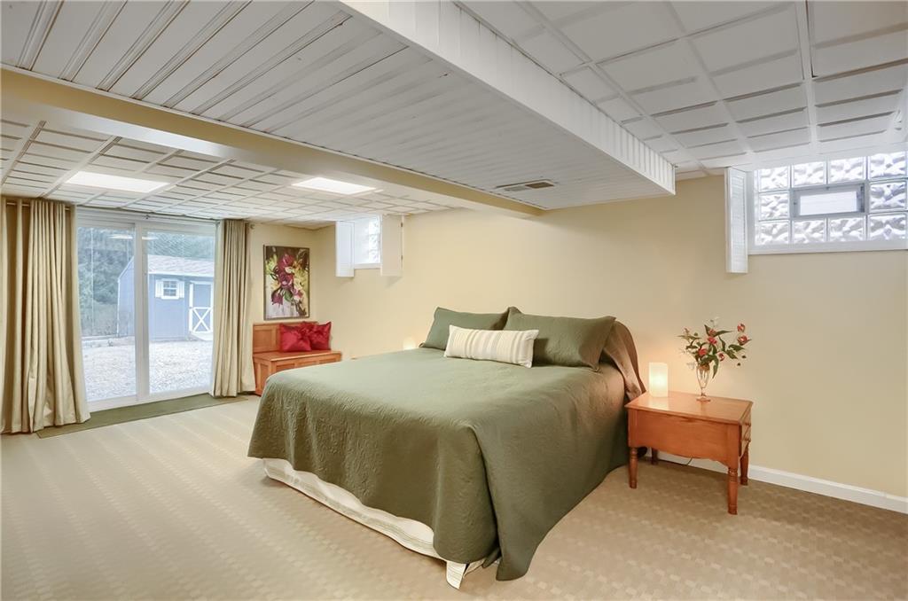 220 Kilgallen Road Butler, PA 16002 - Photo 34 of 50 a spacious bedroom with a bed and a table