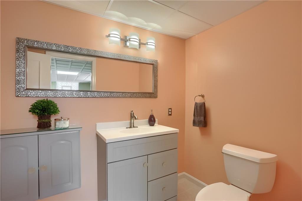 220 Kilgallen Road Butler, PA 16002 - Photo 37 of 50 a bathroom with a toilet a sink and mirror