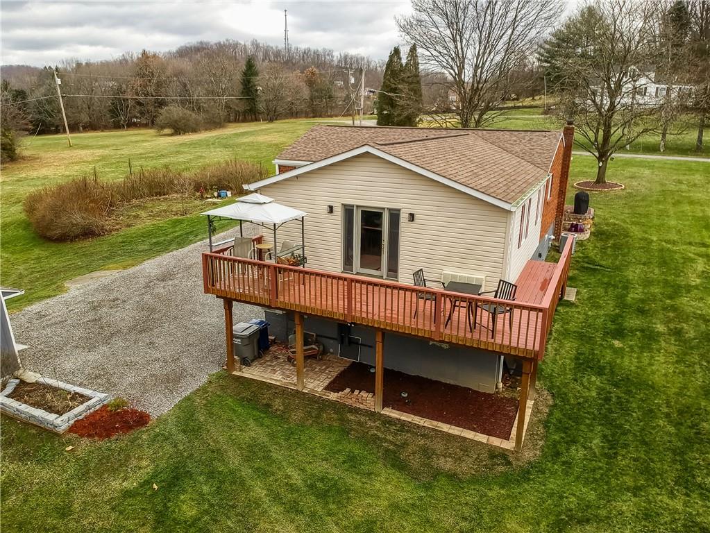 220 Kilgallen Road Butler, PA 16002 - Photo 48 of 50 an aerial view of a house with a yard table and chairs
