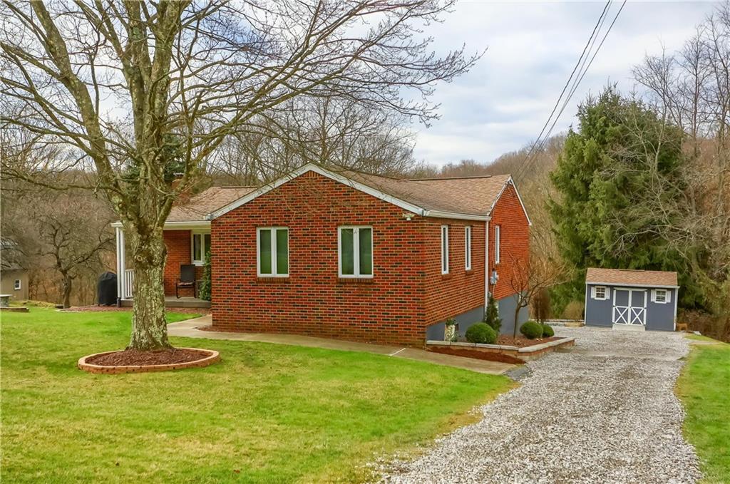 220 Kilgallen Road Butler, PA 16002 - Photo 49 of 50 a front view of a house with garden