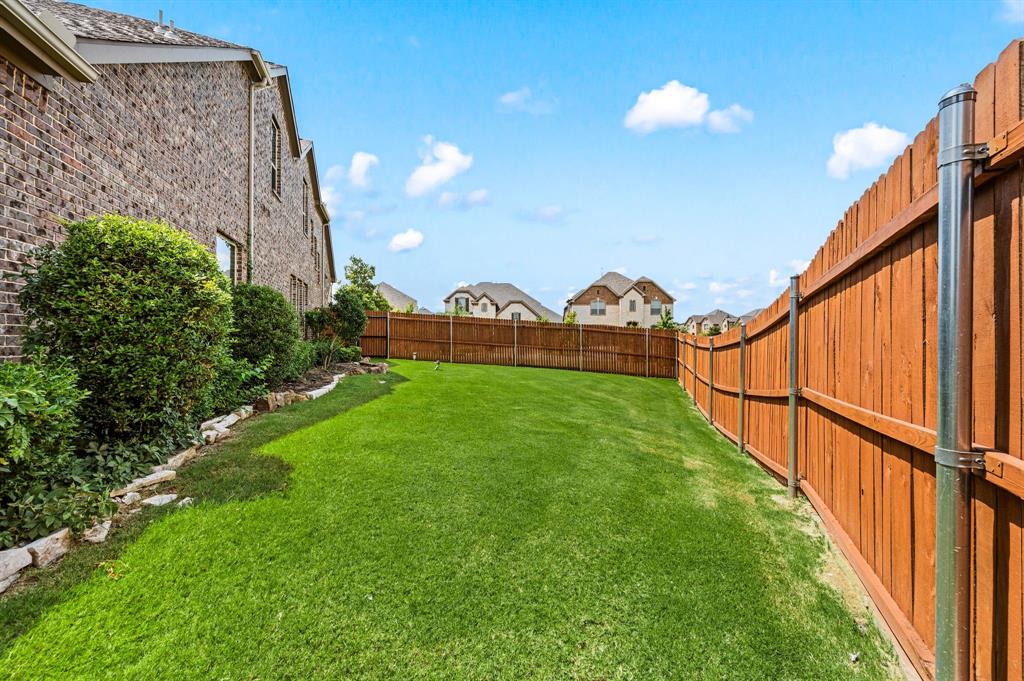 616 Whitetail Road Euless, TX 76039 - Photo 32 of 39 Fenced backyard with a residential view