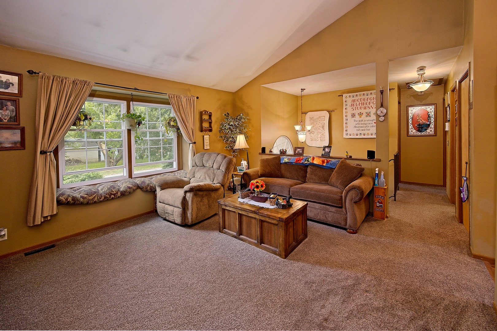 902 Wilson Court Zion, IL 60099 - Photo 12 of 30 a living room with furniture and a large window
