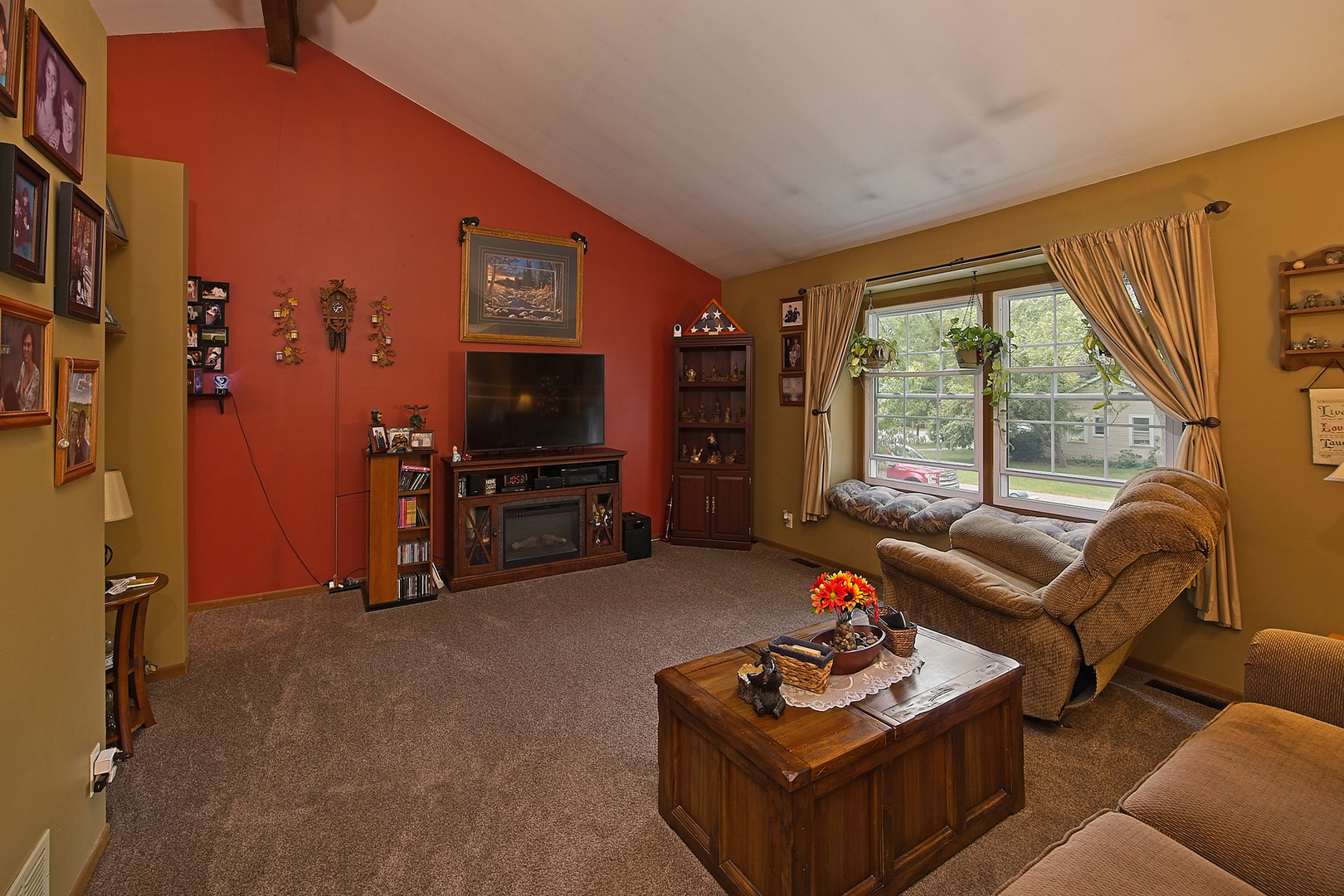 902 Wilson Court Zion, IL 60099 - Photo 13 of 30 a living room with furniture and a flat screen tv