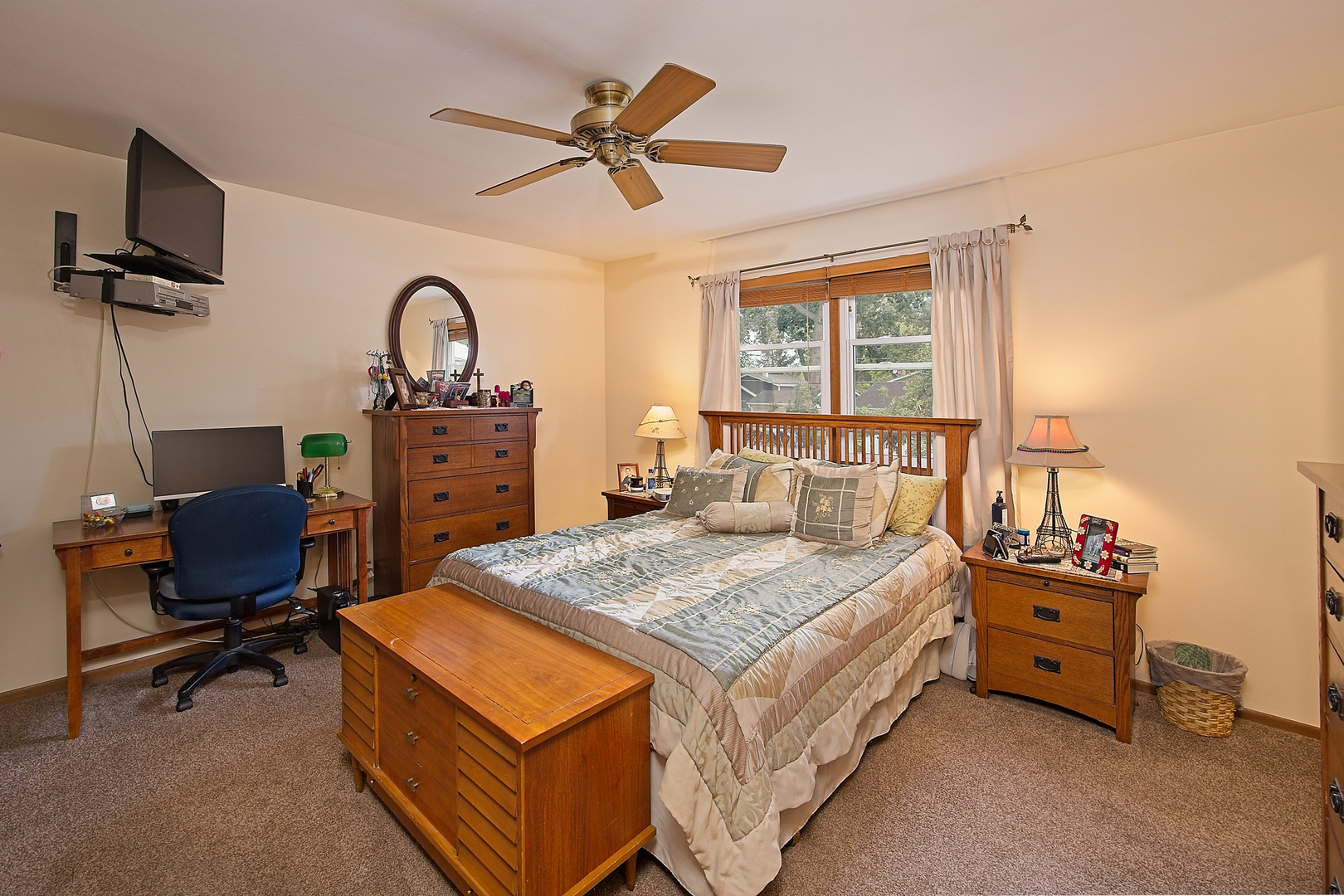 902 Wilson Court Zion, IL 60099 - Photo 21 of 30 a bedroom with a bed and a table