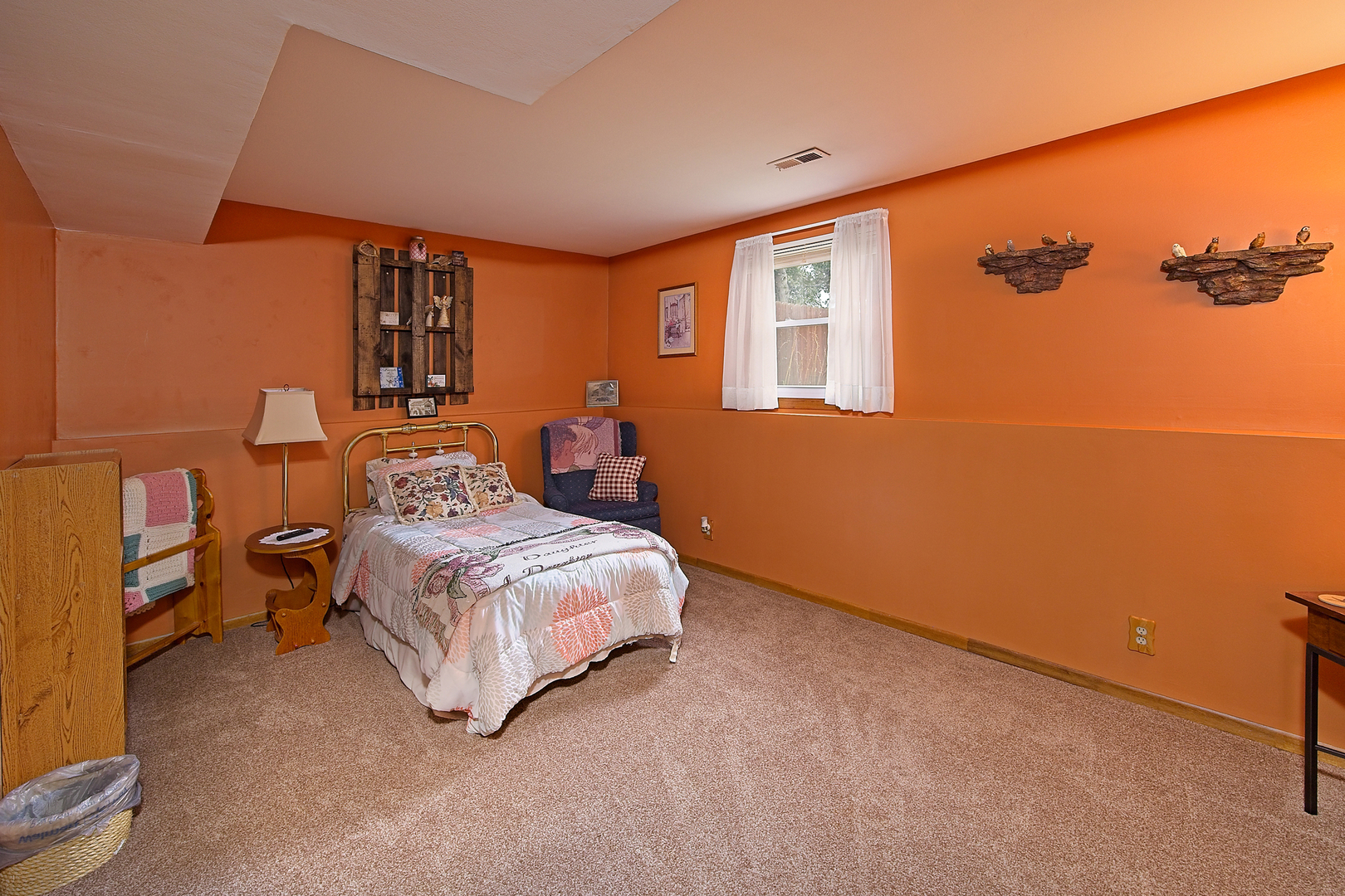 902 Wilson Court Zion, IL 60099 - Photo 23 of 30 a spacious bedroom with a bed and a window