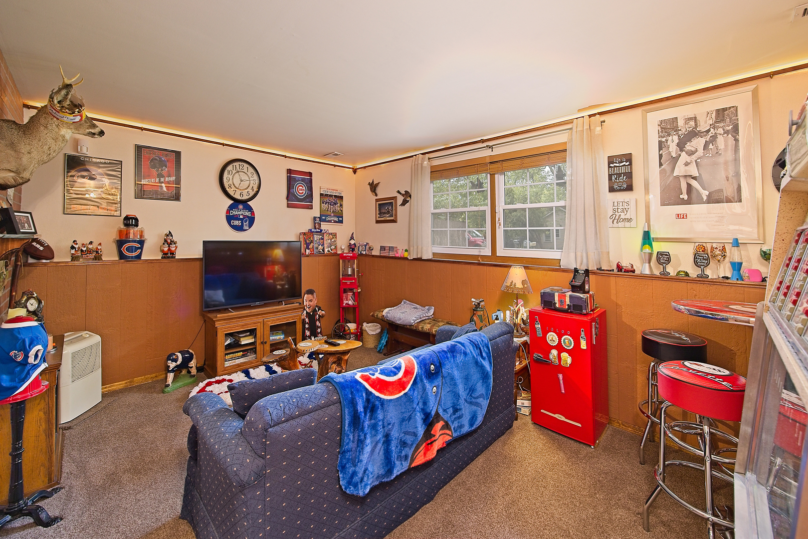 902 Wilson Court Zion, IL 60099 - Photo 28 of 30 a living room with furniture and a flat screen tv