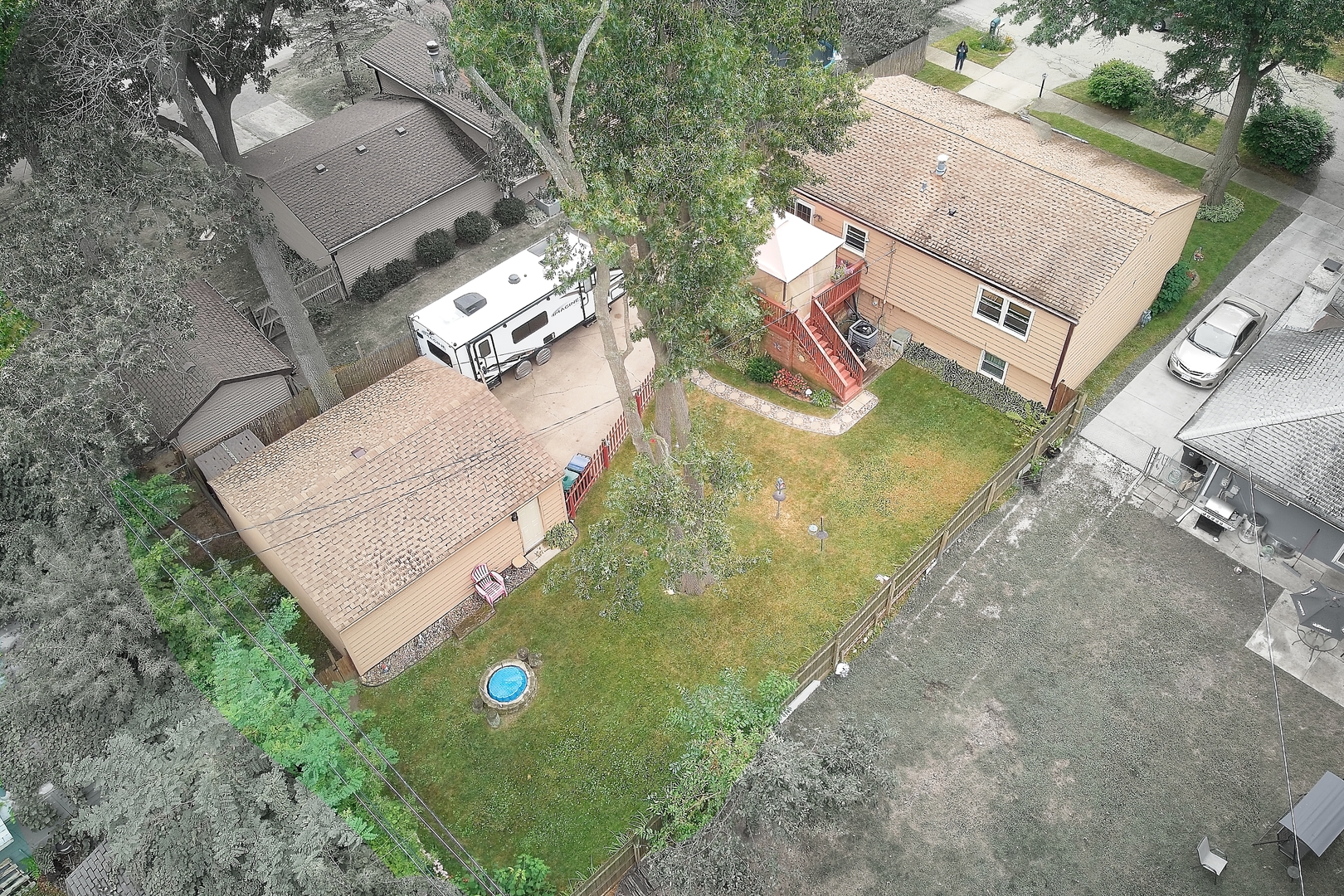 902 Wilson Court Zion, IL 60099 - Photo 7 of 30 an aerial view of residential house with outdoor space