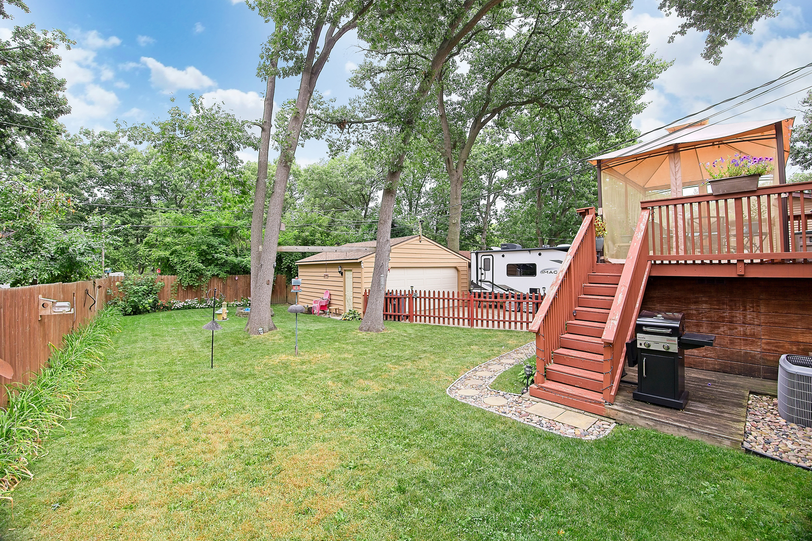 902 Wilson Court Zion, IL 60099 - Photo 9 of 30 a view of a house with a yard and furniture