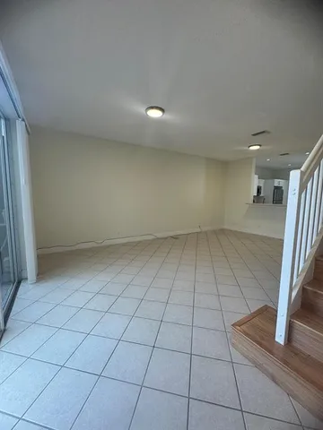 a kitchen with stainless steel appliances granite countertop a refrigerator sink and cabinets