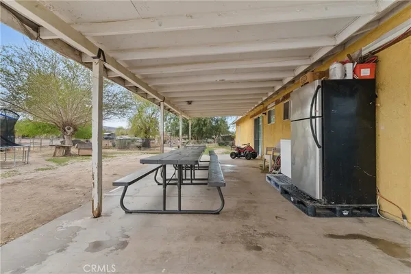 a view of a porch with furniture