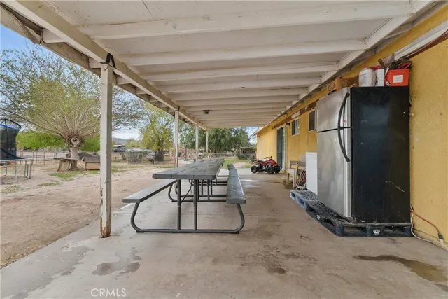 a view of a porch with furniture