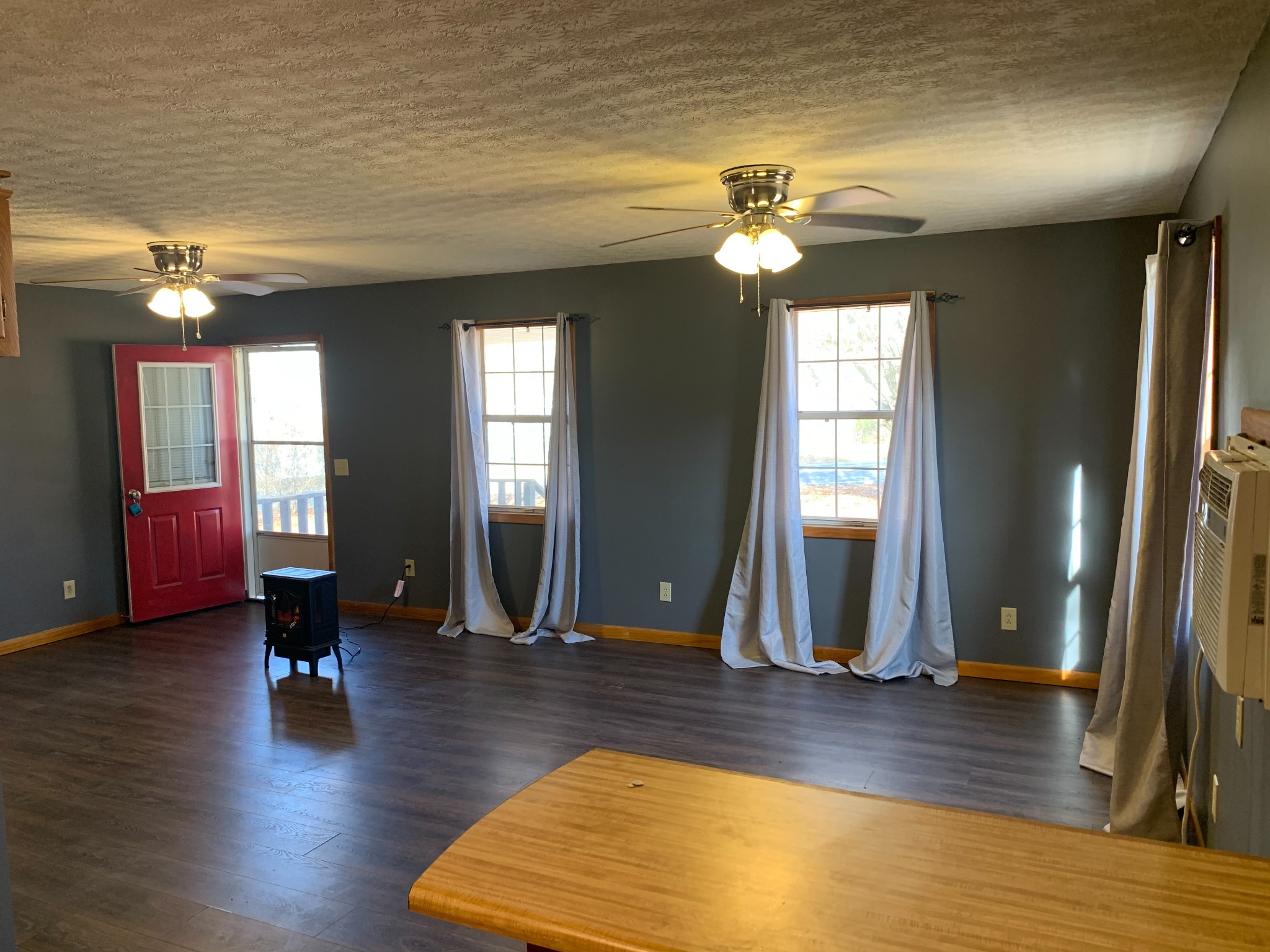 437 Bennett Hill Road Red Boiling Springs, TN 37150 - Photo 3 of 4 a view of a livingroom with wooden floor