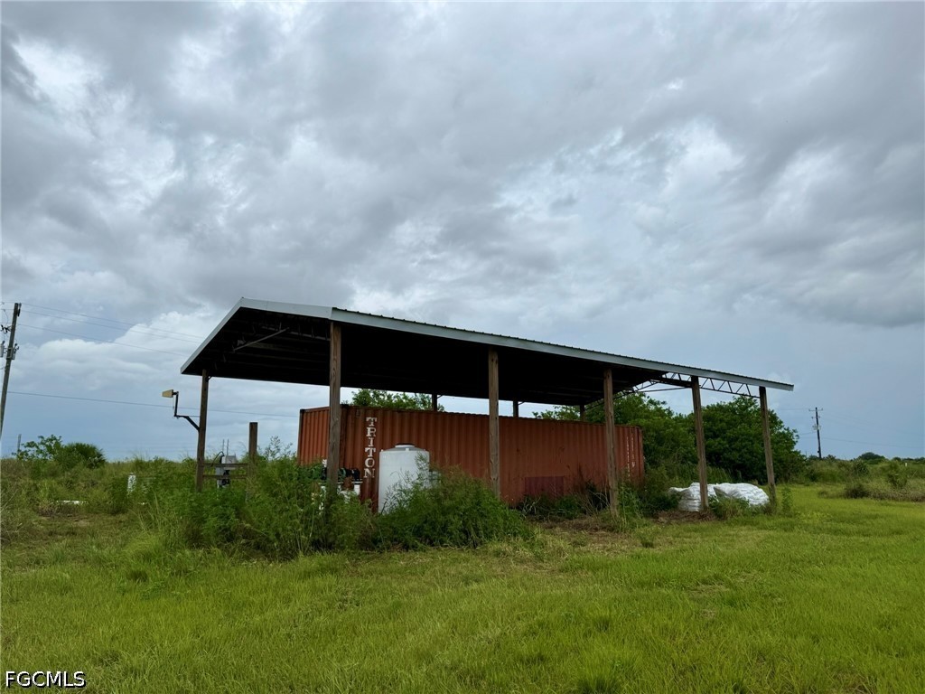 6658-6680 4th Road LaBelle, FL 33935 - Photo 4 of 14 a view of a back yard