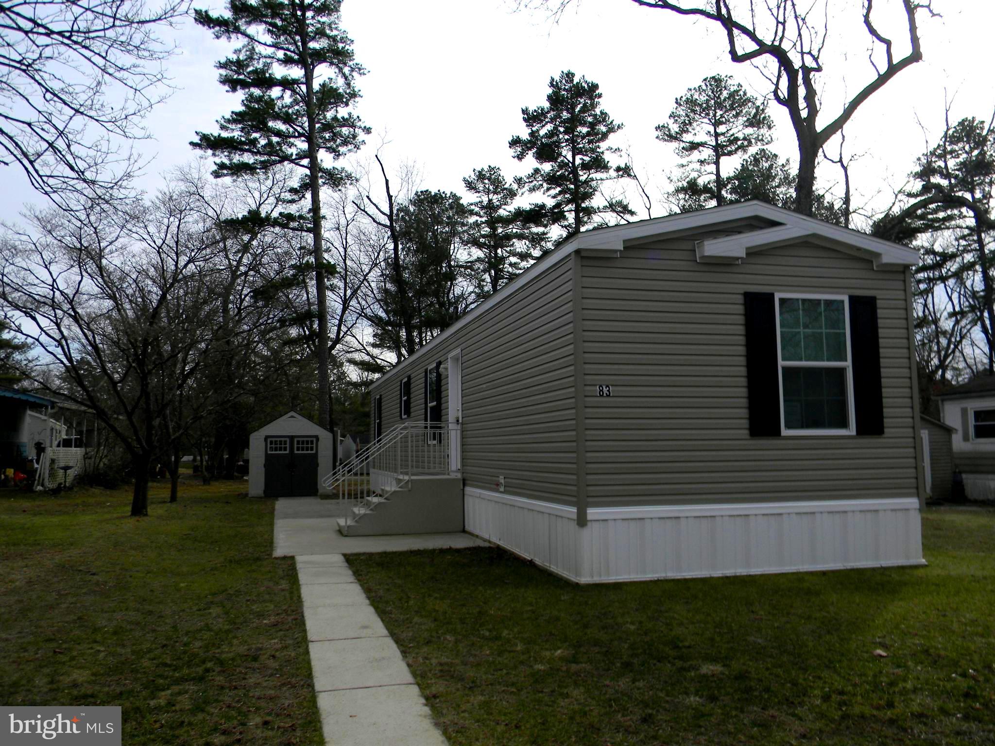 83 Holly Court Tabernacle, NJ 08088 - Photo 28 of 44 a front view of a house with a garden