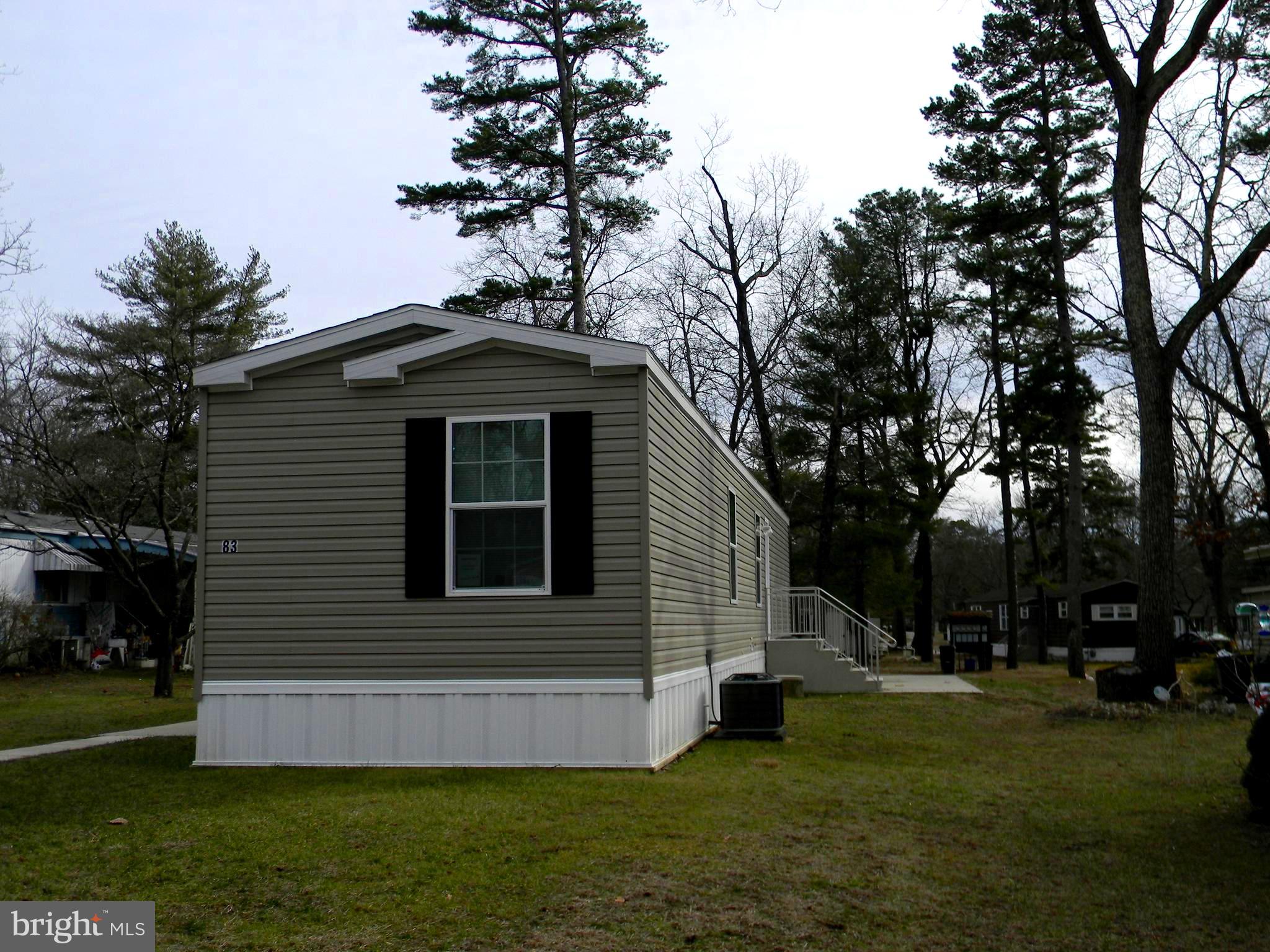 83 Holly Court Tabernacle, NJ 08088 - Photo 30 of 44 a front view of a house with a garden