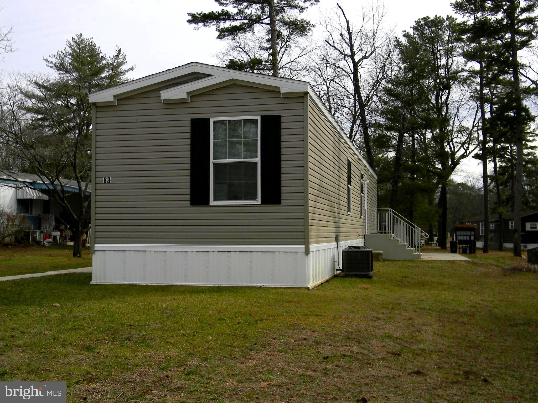 83 Holly Court Tabernacle, NJ 08088 - Photo 31 of 44 a front view of a house with a yard
