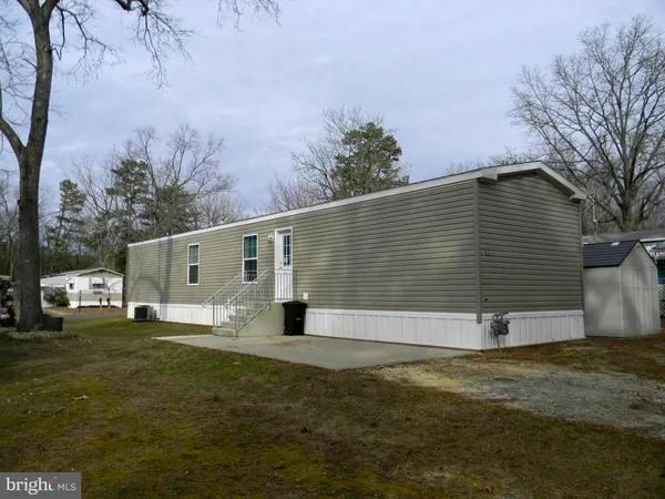 a house with yard in front of it