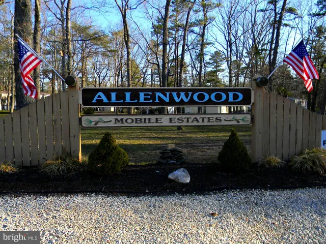 a view of a street with benches