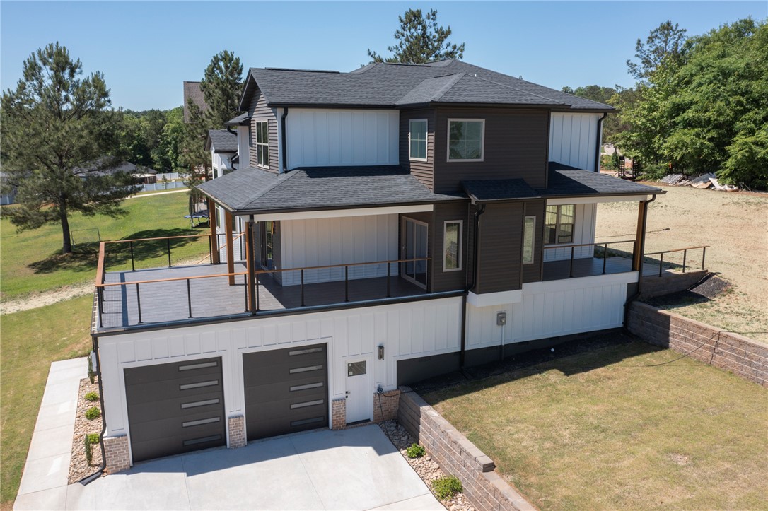 230 Hammond Circle Anderson, SC 29621 - Photo 2 of 48 This newly constructed residence showcases a seamless fusion of modern design and functional living spaces.