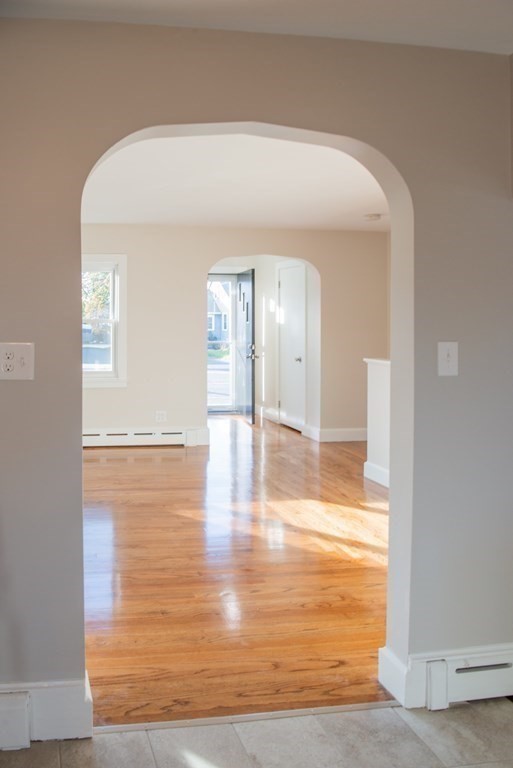 599 Granby Road Chicopee, MA 01013 - Photo 12 of 41 a view of empty room with wooden floor