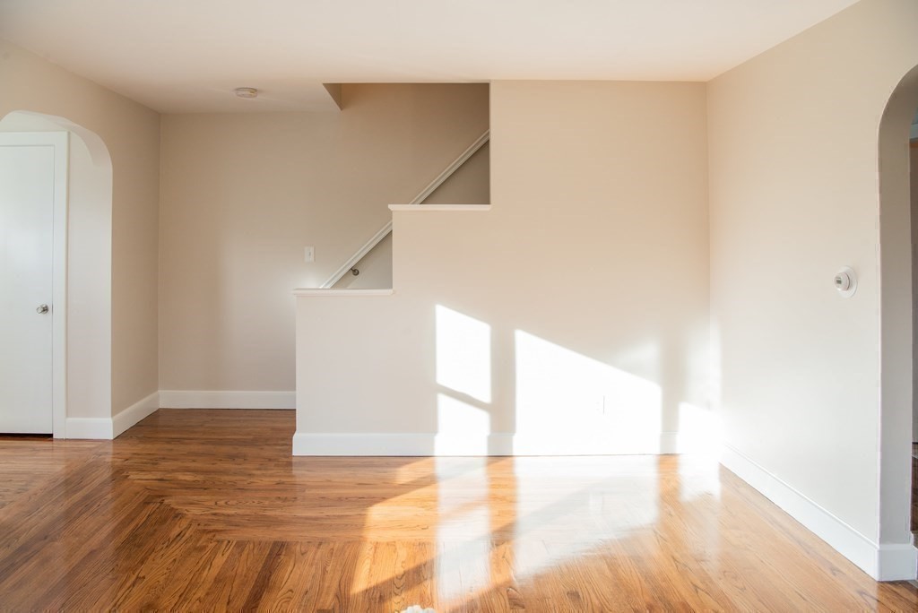 599 Granby Road Chicopee, MA 01013 - Photo 20 of 41 a view of a big room with wooden floor and windows