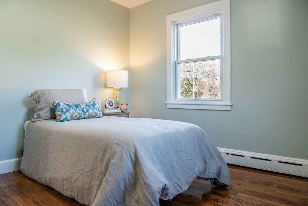 599 Granby Road Chicopee, MA 01013 - Photo 28 of 41 a bedroom with a bed and a window