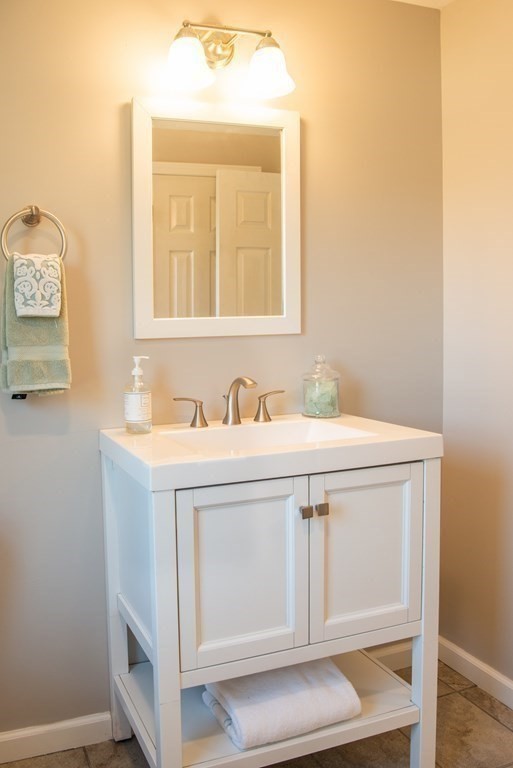 599 Granby Road Chicopee, MA 01013 - Photo 33 of 41 a bathroom with a sink and a mirror