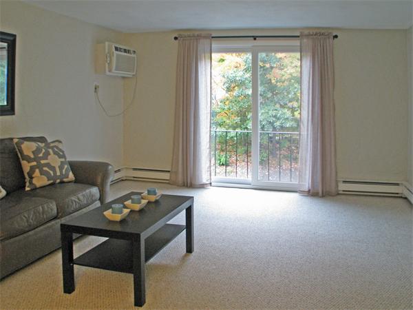 232 Swanson Road, Unit 634 Boxborough, MA 01719 - Photo 3 of 29 a living room with furniture and a window
