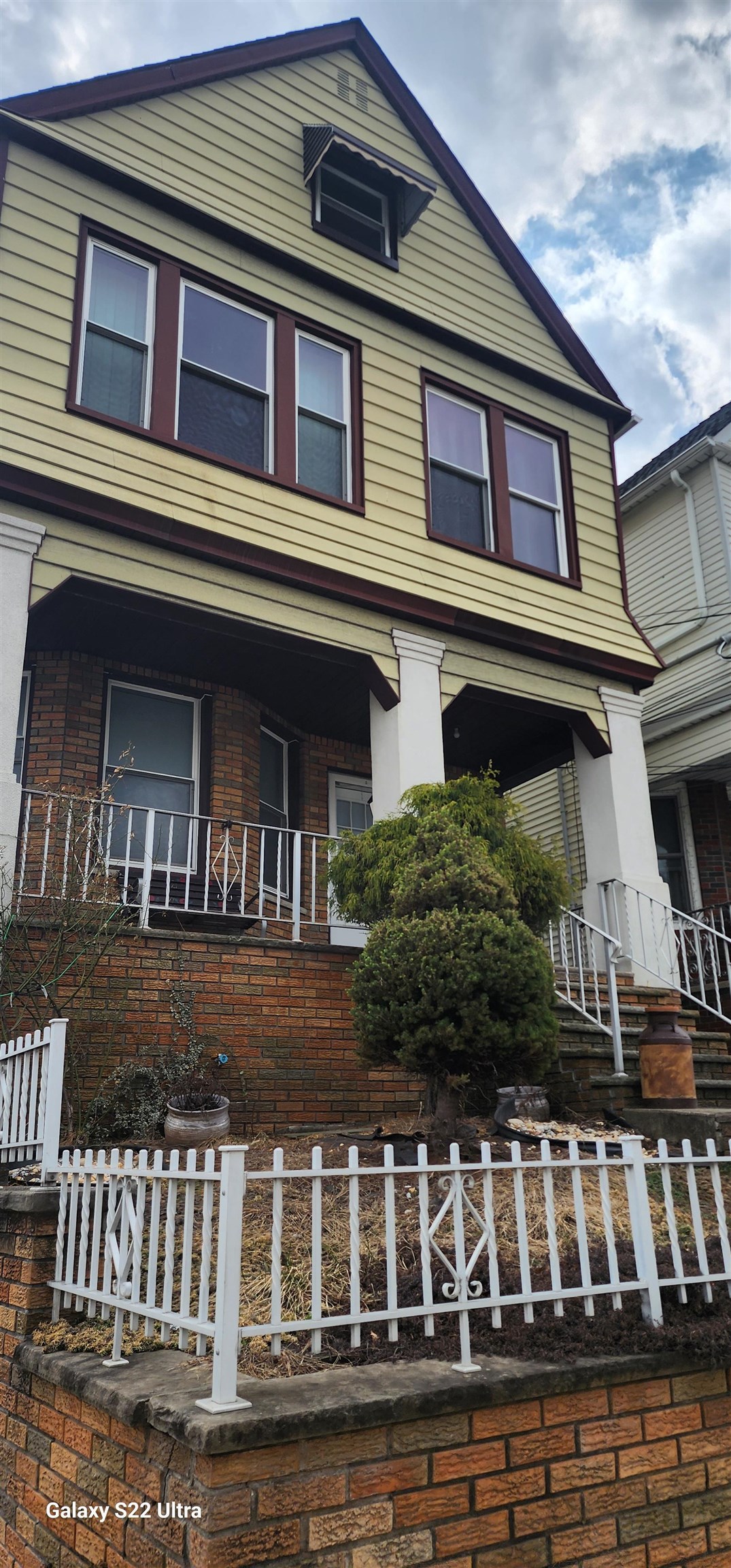 44 East 4th Street, Unit 1 Bayonne, NJ 07002 - Photo 2 of 10 a front view of a house with windows