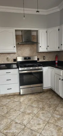a bathroom with a sink a toilet and a bathtub