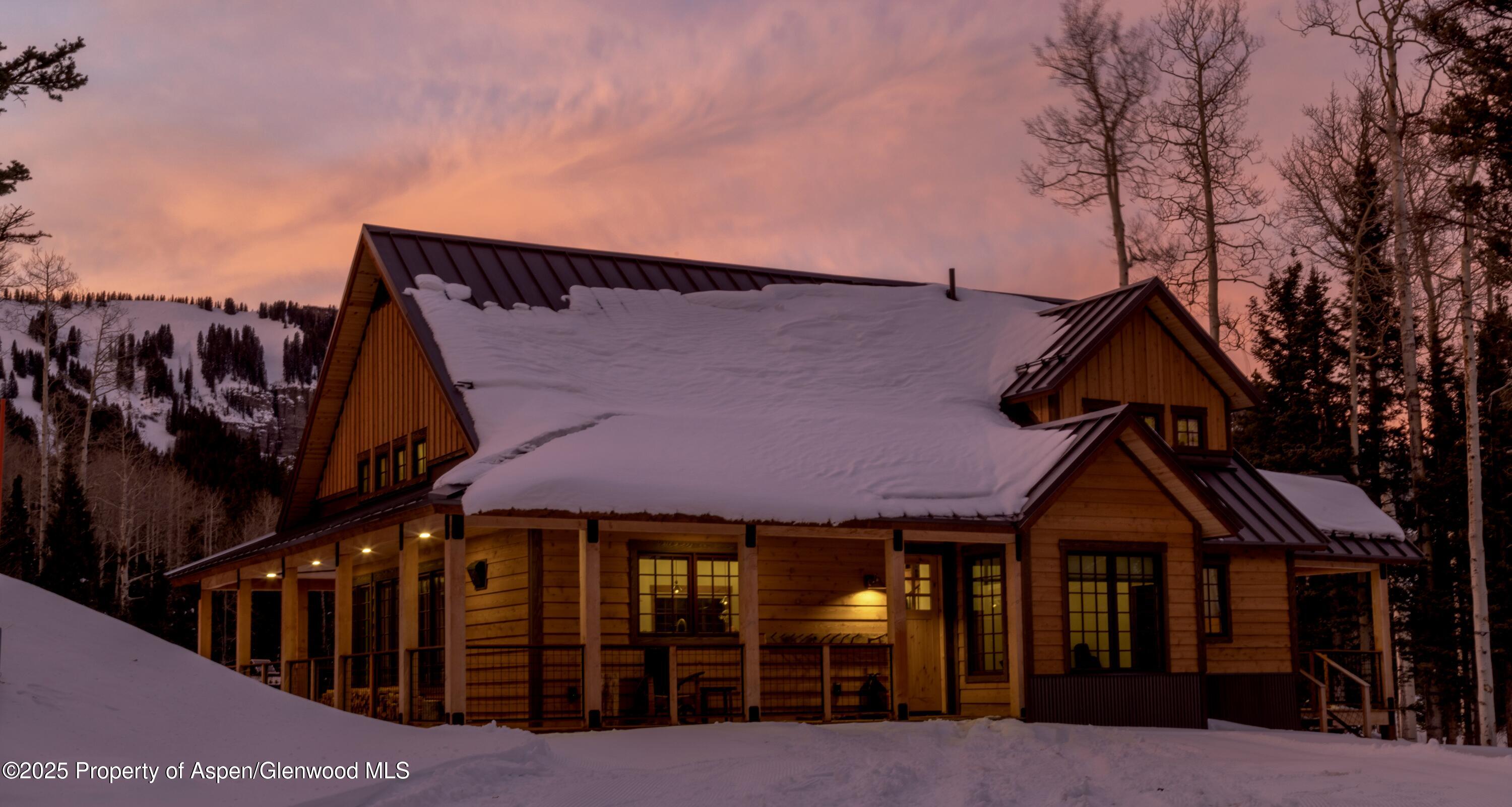 4901 Cimarron Mountain Road Montrose, CO 81403 - Photo 2 of 39 a front view of a house