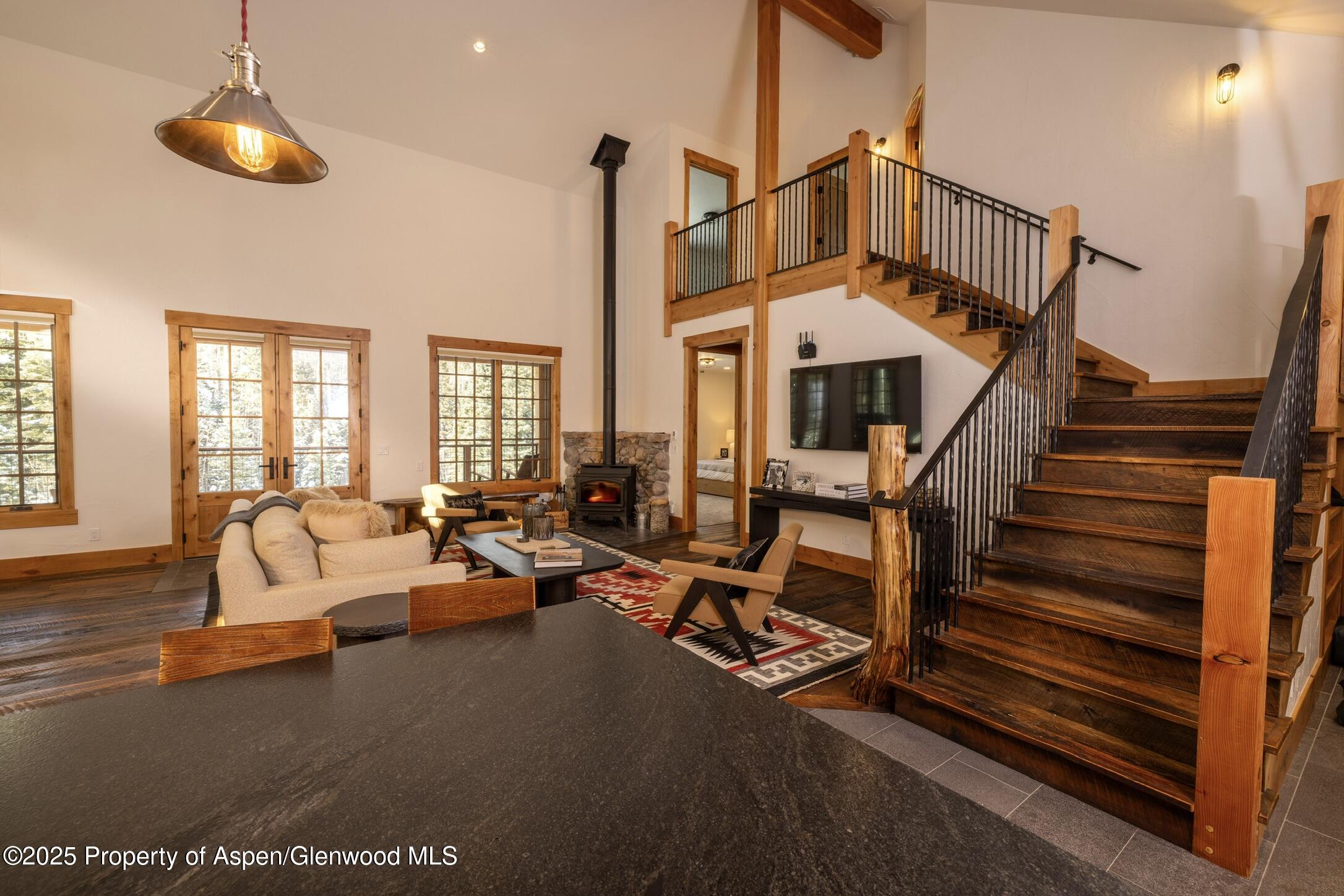 4901 Cimarron Mountain Road Montrose, CO 81403 - Photo 6 of 39 a view of a living room with balcony