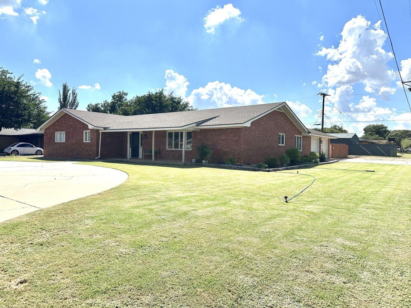 819 Holliday Plainview, TX 79072 - Photo 2 of 38 a view of a house with swimming pool
