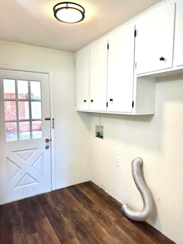 a view of cabinets and window