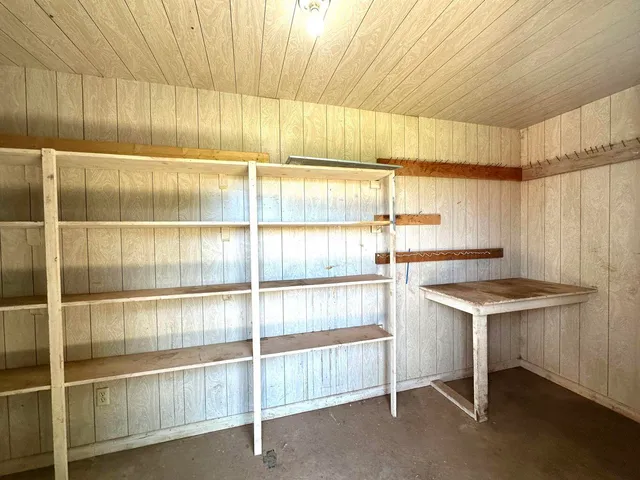 a room with a window and a table