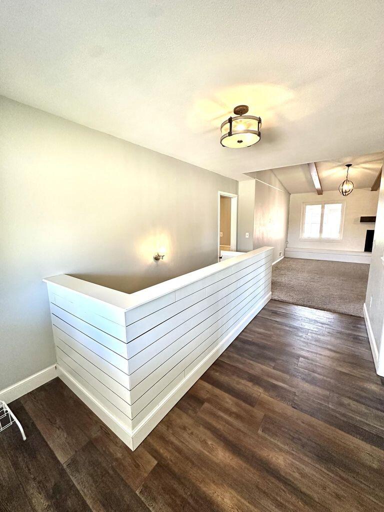 819 Holliday Plainview, TX 79072 - Photo 5 of 38 a view of a hallway with wooden floor