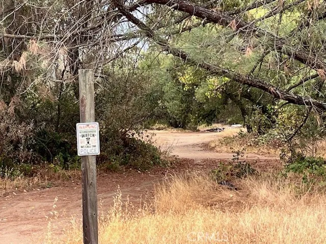 0 Lower Wyandotte Road Oroville, CA 95966 - Photo 6 of 22 a street sign on a road next to a road