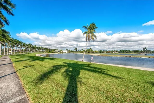 a view of a lake with a big yard